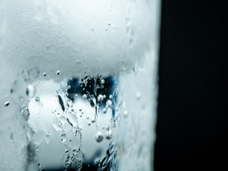 Naklejka na ściany i meble Condensation on an Ice-Cold Glass
