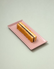 Japanese cuisine with red bean concoction and butter in bread.