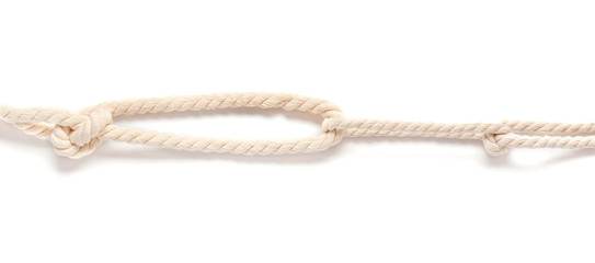 Rope with knots on white background