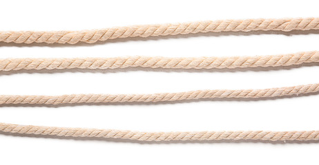 Ropes on white background, top view