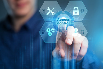 Business, Technology, Internet and network concept. Young businessman working on a virtual screen of the future and sees the inscription:Access control .