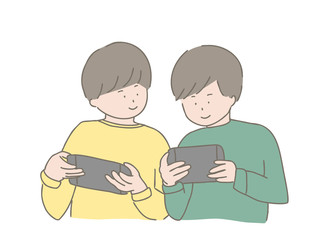 一緒にゲームをする男の子たち