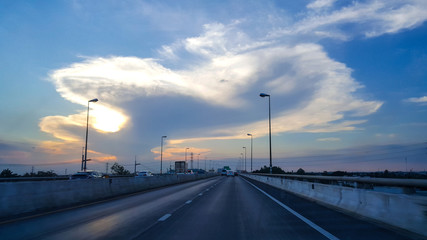 Sunset above high way , amazing sky color and cloud.