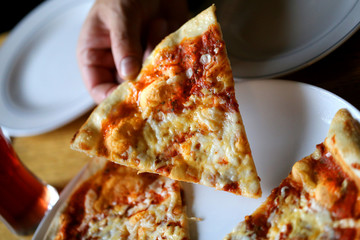 Photo macro of a tasty slice of pizza
