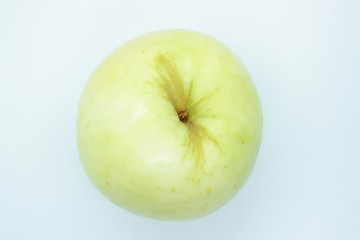 Green apple located on a white background