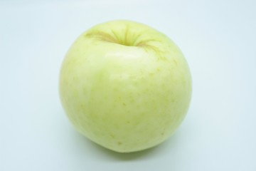 Green apple located on a white background