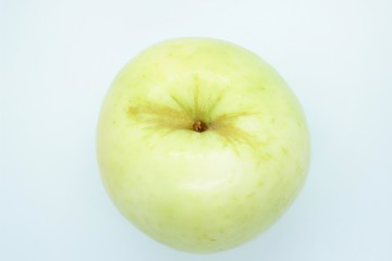 Green apple located on a white background