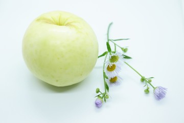 Green apple located on a white background