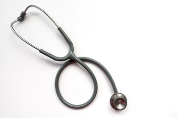 Stethoscope on a white background with space for text.