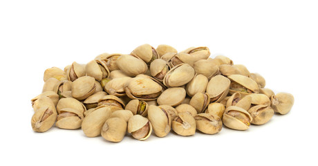 Closeup pistachios nut dry roasted and salted isolated on white background