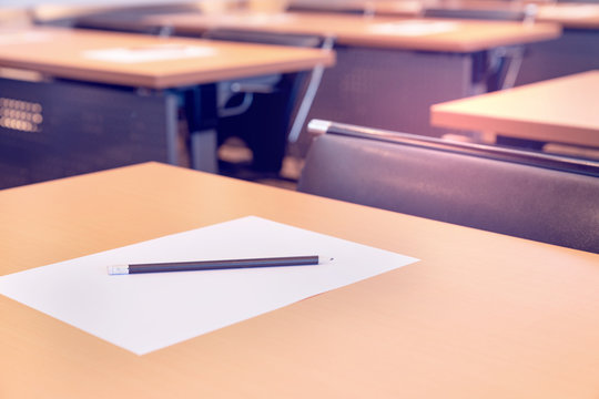 Pencil and paper in meeting room