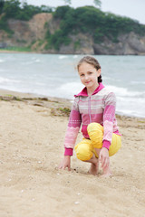 Girl on the sea beach.