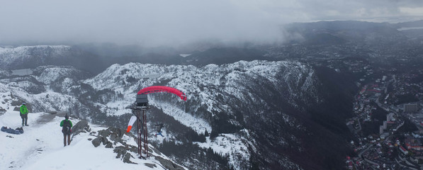 Guys making paraglading in Bergen Norway