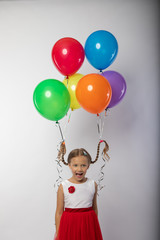 Fototapeta na wymiar girls with tied balloons