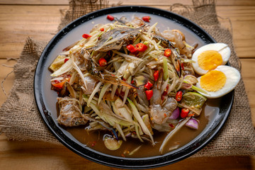 Papaya salad with crab, Som tum, Thailand Food Papaya Salad with Blue Crab and cockle