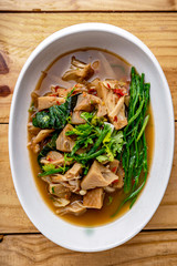 Jackfruit Curry,Northern Thai Food, Curry young jackfruit with fresh small tomato and green veggie,Jackfruit curry, local food in northern Thailand The food is delicious and spicy.