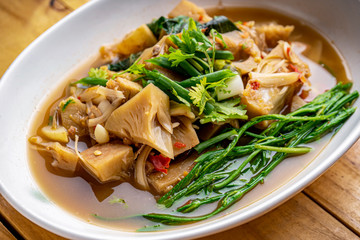 Jackfruit Curry,Northern Thai Food, Curry young jackfruit with fresh small tomato and green veggie,Jackfruit curry, local food in northern Thailand The food is delicious and spicy.