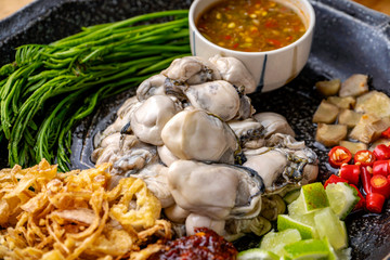 Oysters,Spicy Oyster Salad,Yum, Oyster and side dishes in Thai style, Thai style oysters with spicy dipping sauce