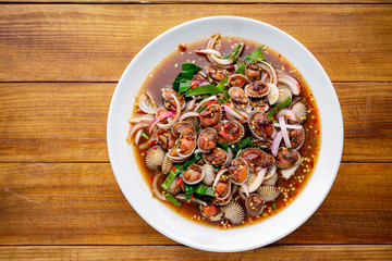 Cockle Salad,Cockles salad / Hot and spicy shellfish blood cockles salad mix vegetable tomato herb and spices thai style food