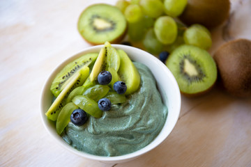 Spirulina smoothie bowl with green fruit
