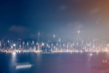 Abstract colorful circular bokeh with city background. Double exposure