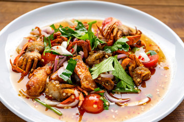 yum , salad,Three Crispy Salad, spicy salad ,Deep-fried shrimp head and fried crab to make salad.