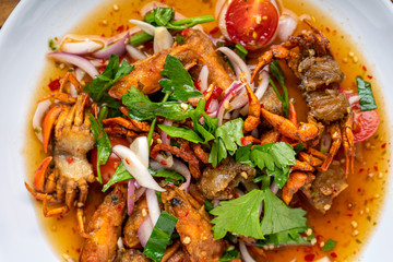 yum , salad,Three Crispy Salad, spicy salad ,Deep-fried shrimp head and fried crab to make salad.