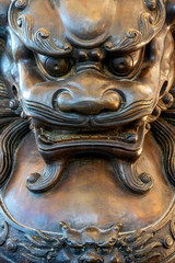 Jie Kong Shrine, Phanjang Wang District, Chiang Rai, 9-10-2019, Lion statue in front of chinese temple,Bronze lion in a Chinese temple