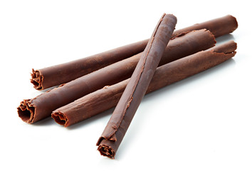 chocolate sticks on white background