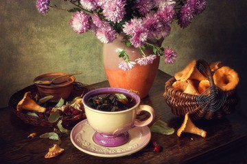 Obraz na płótnie Canvas Still life with tea cup and sweets