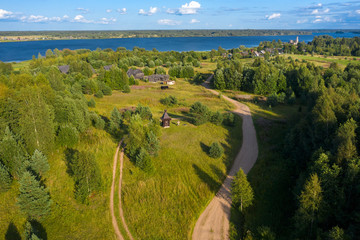 Aerial view from above of a  wayside cross and chapel. Tver region, Russia. On the way from Varangians to Greeks