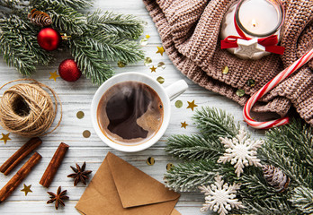 Obraz na płótnie Canvas Cup of coffee and Christmas decorations