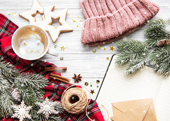 Cup of coffee and Christmas decorations