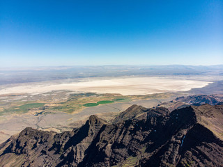 Naklejka na ściany i meble Aerial panoramic view at Alvord desert behind summit of Steens Mountains, south Oregon