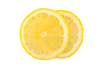 slices of yellow lemon on a white background