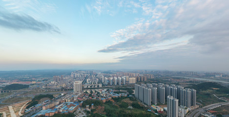 Fototapeta premium Aerial panoramic view landscape of urban buildings at dusk, Nanning, China