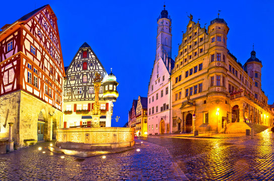 Main square (Marktplatz or Market square) of medieval German town of Rothenburg ob der Tauber evening panoramic view.