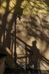 Kiev, Ukraine The shadow of a pedestrian on an old staircase in the Podil area of town.