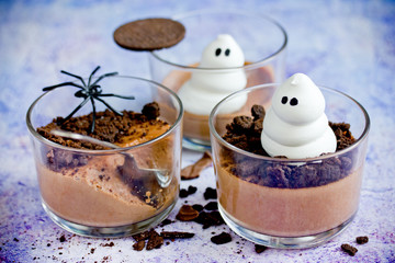Halloween ghost chocolate dessert in glass for kids party