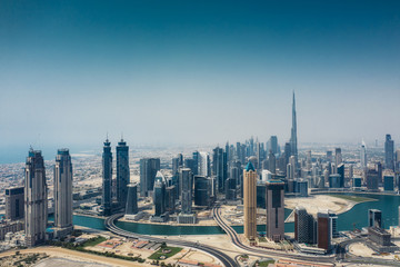 Aerial view on skyscrapers of Dubai, UAE, on a summer day