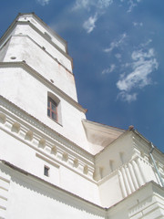 A white tower and blue sky