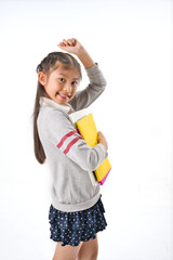 Asian Little girl hold study book and laptop on white background, Education Concept