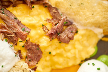 Close-up Pumpkin Risotto with with duck and parmesan cheese mousse. Seasonal autumnal recipe - risotto with organic pumpkins.