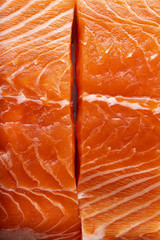 fresh salmon, cut into pieces and ready for cooking. fish cutting