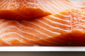 fresh salmon, cut into pieces and ready for cooking. fish cutting
