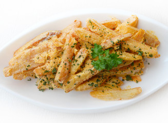 French fries seasoned with Salted Egg on the white plate.
