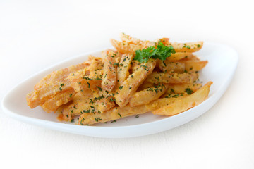French fries seasoned with Salted Egg on the white plate.