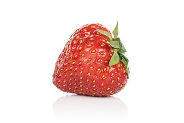 One whole fresh red strawberry isolated on white background
