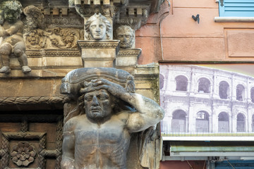 old door and statues in the old town of Frejus, resort city on the Cote d'Azur in France