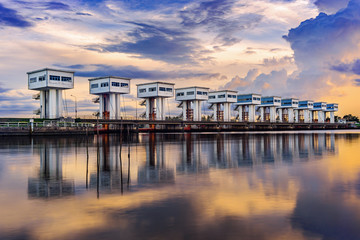 Water barrier with color of cloud sky and river